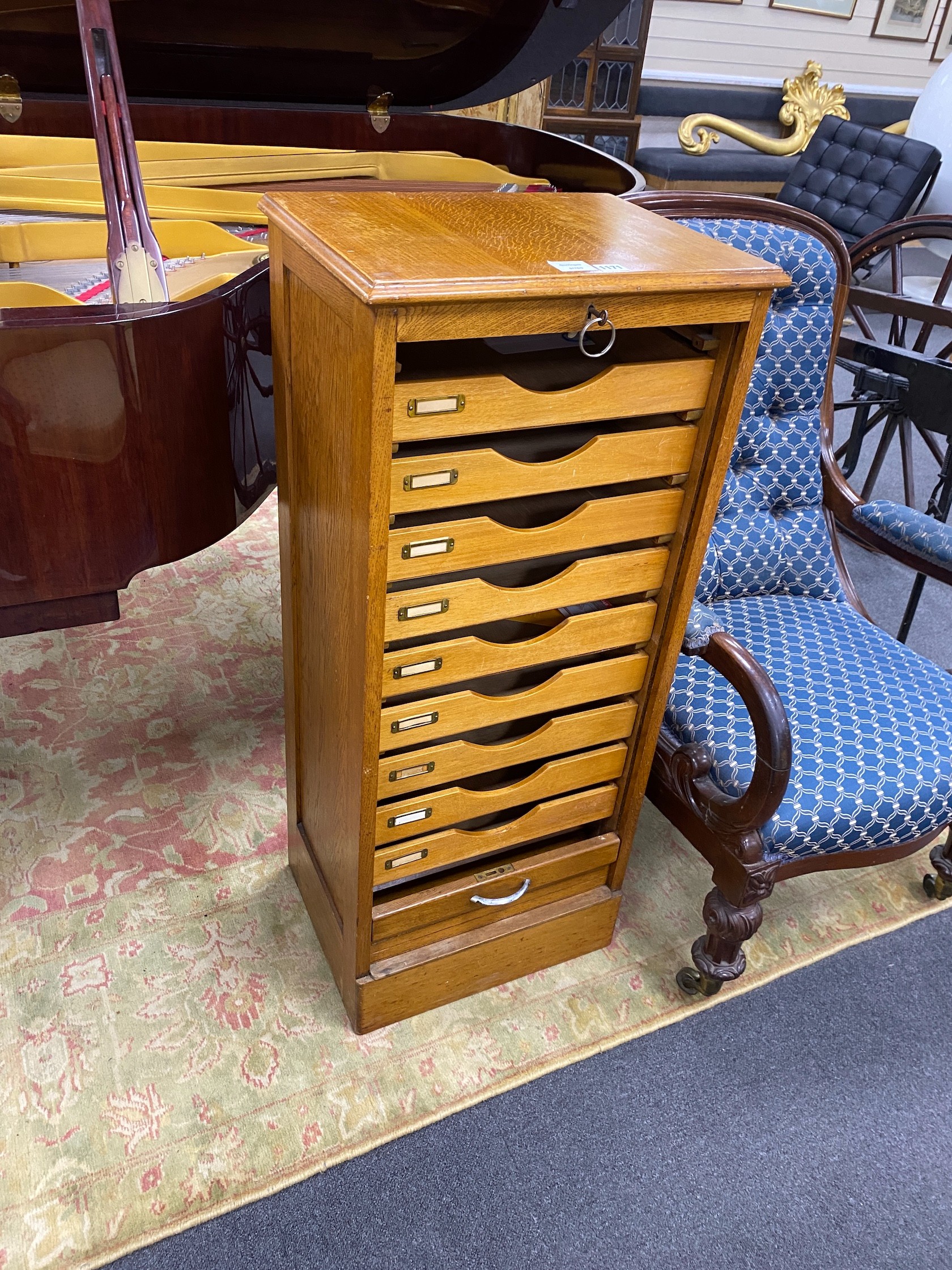 A mid 20th century oak tambour filing cabinet, width 47cm, depth 36cm, height 110cm
